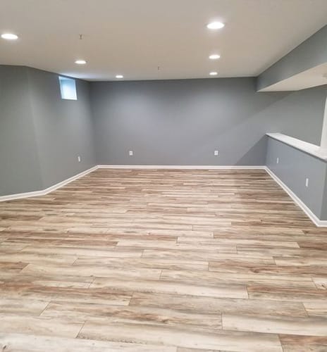Wide view of wooden flooring installed inside a living room